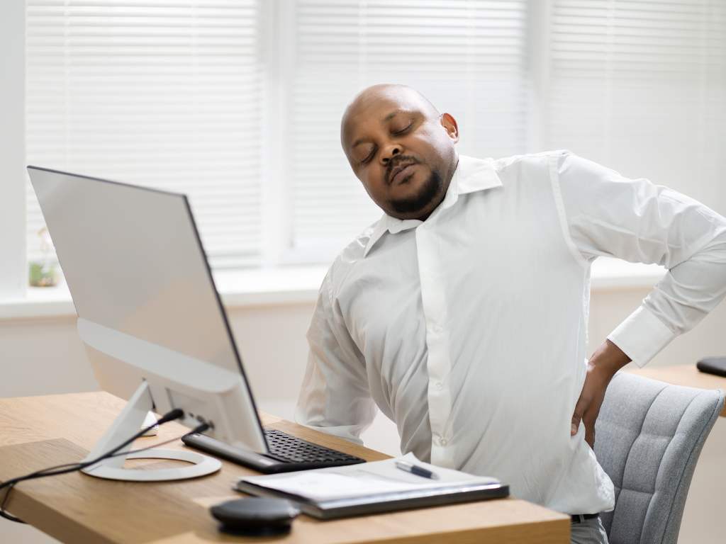 Back Pain When Sitting: Common Causes and Solutions To Fix It